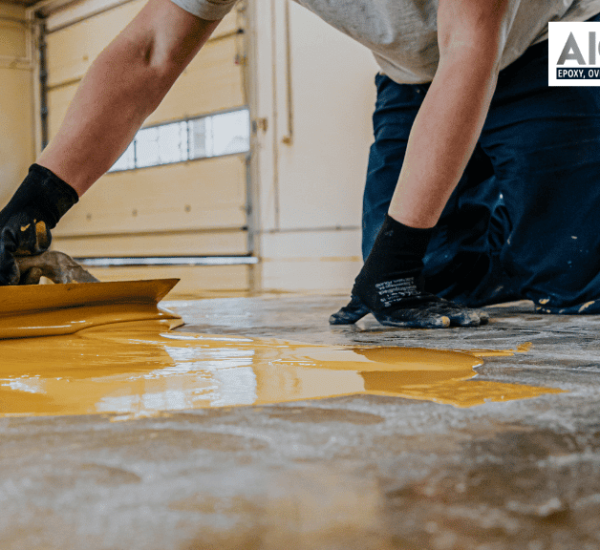contractor installing epoxy flooring
